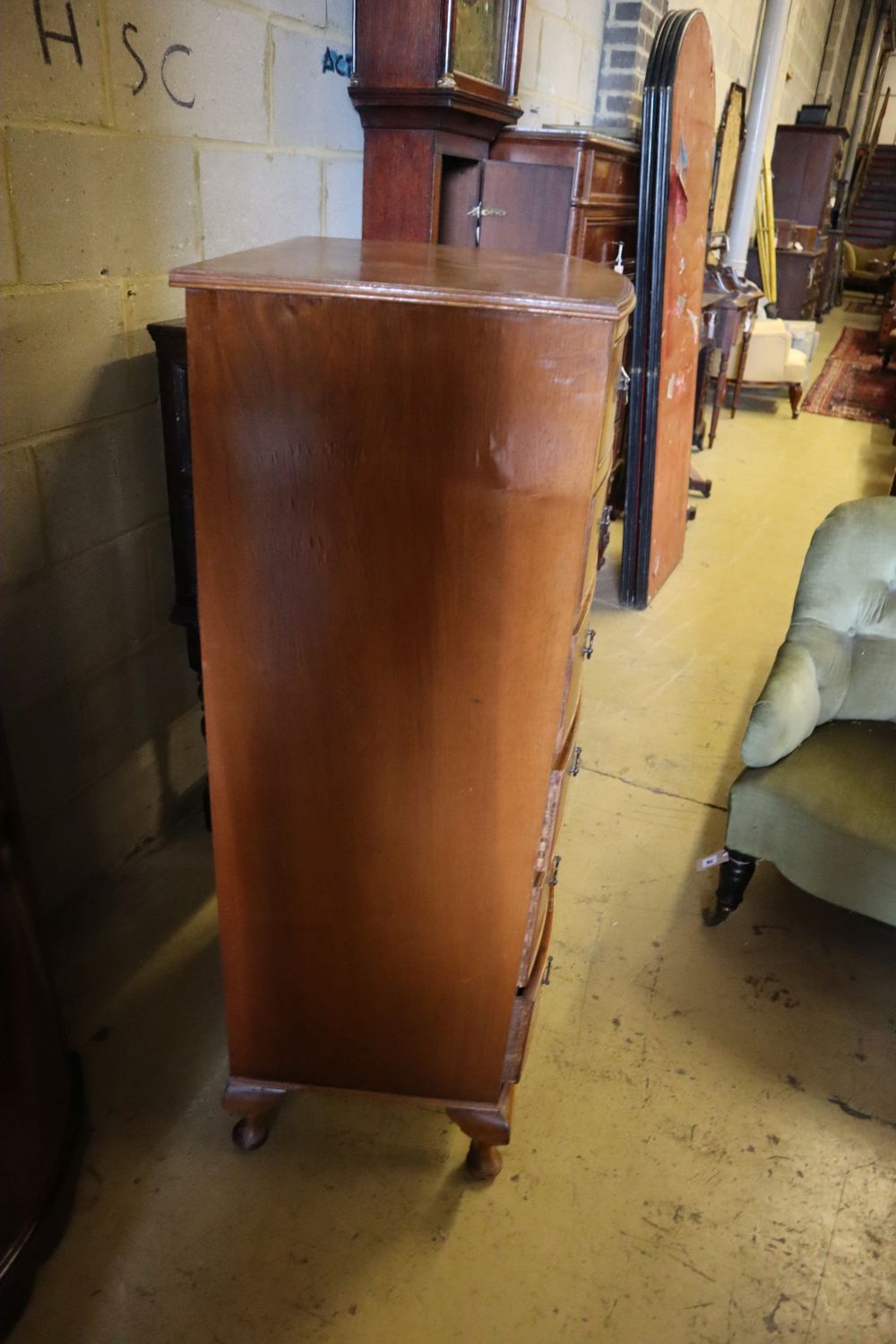A reproduction walnut bow front six drawer chest, width 63cm depth 43cm height 123cm